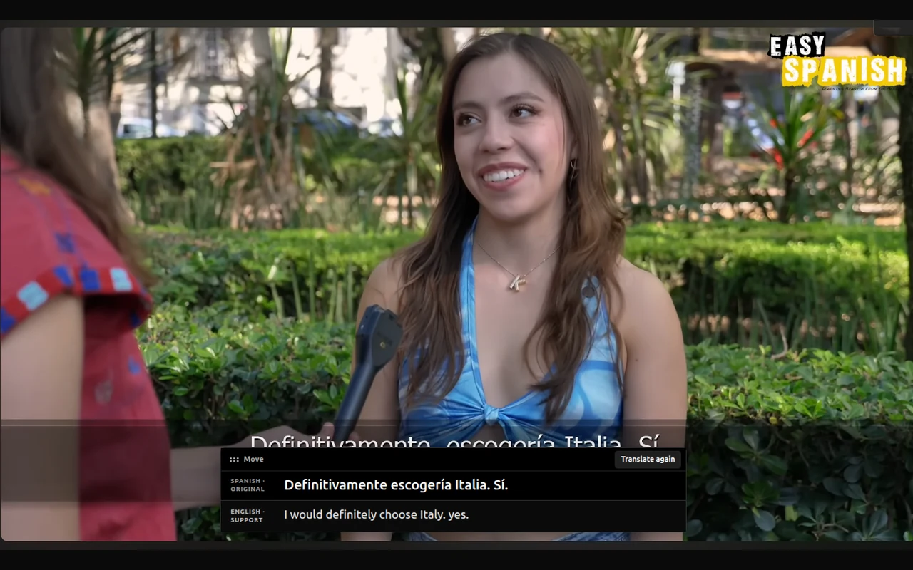 PinSpanish on YouTube showing the original Spanish subtitle Definitivamente escogería Italia. Sí. and the English translation I would definitely choose Italy. yes.